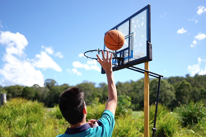 Students playing basketball