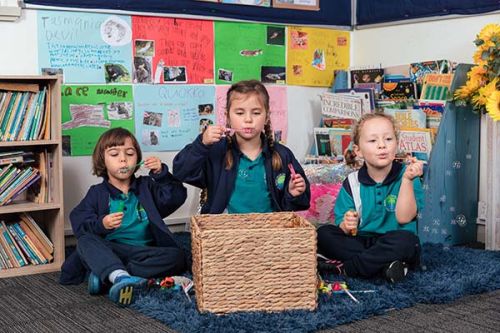 Prep having fun blowing bubbles